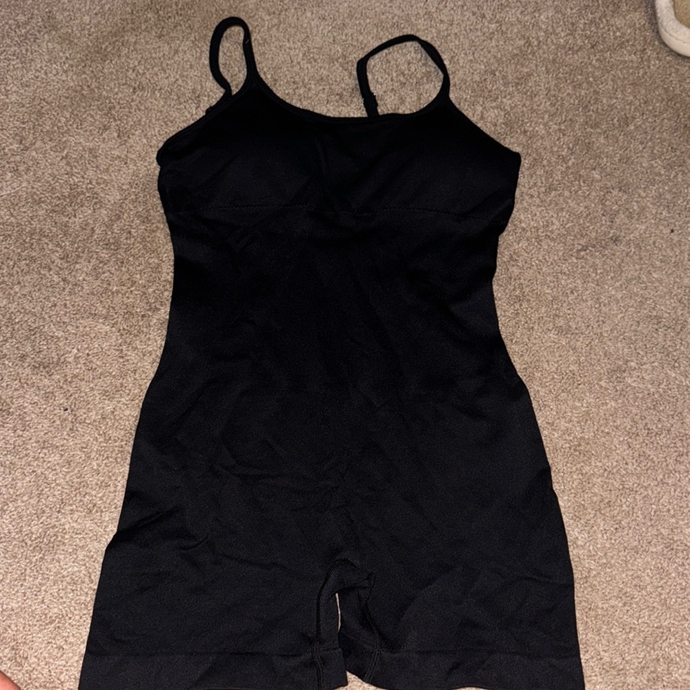 QQQ bodysuit from Amazon. Never worn. Perfect condition.